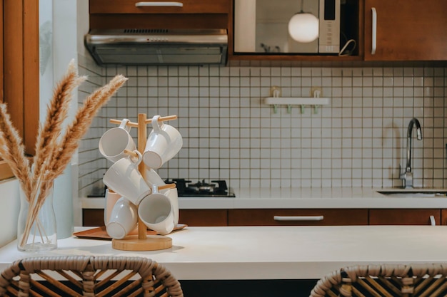 arrangement of white glasses on the kitchen table