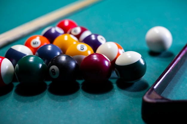 Arrangement with billiard balls and triangle 