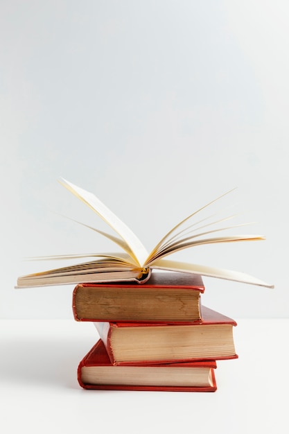 Photo arrangement with books and white background