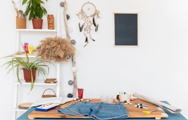 Photo arrangement with clothes on table