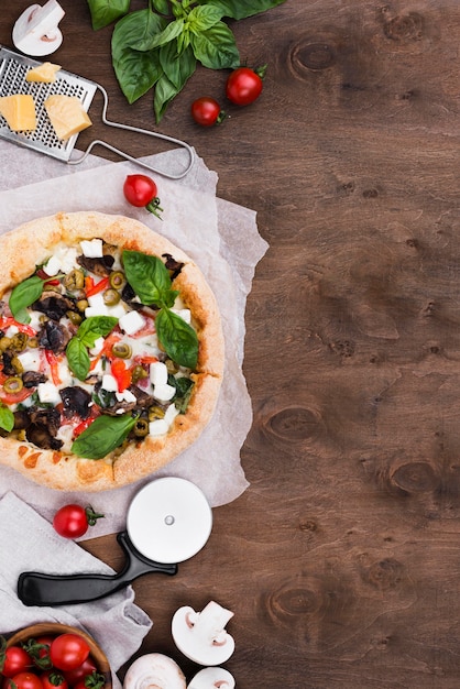 Photo arrangement with pizza and vegetables