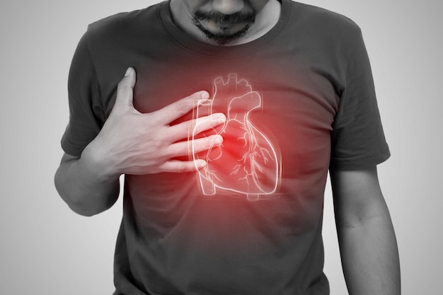 Arrhythmia of asian man on a gray background