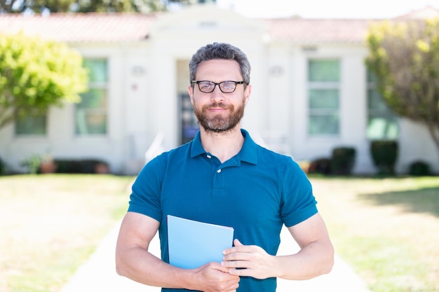 Arrogant man in eyeglasses hold paper vision acuity eyesight\
vision correction