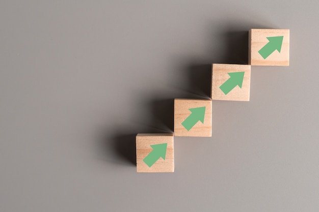 arrow sign on wooden cubes