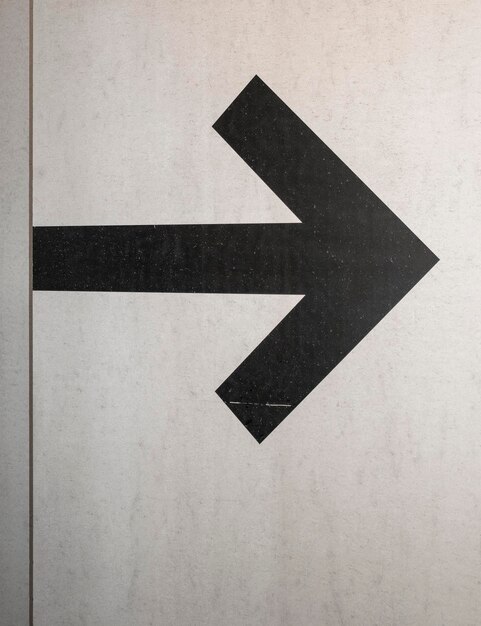 Photo arrow symbol painted on the wall