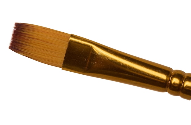 Art brush for oil paints with brown bristles on an isolated background