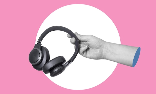 Art collage digital pop contemporary art Handholding headphones on a pink background