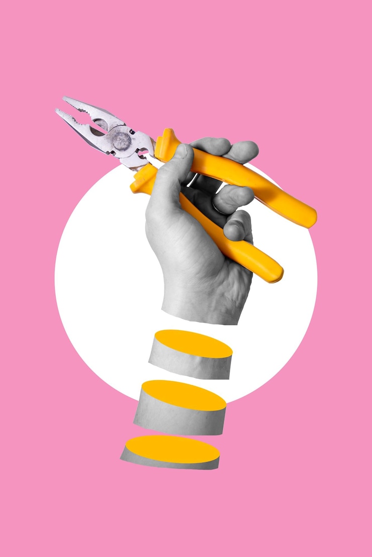 Photo art collage a man's hand holding yellow pliers on a pink background