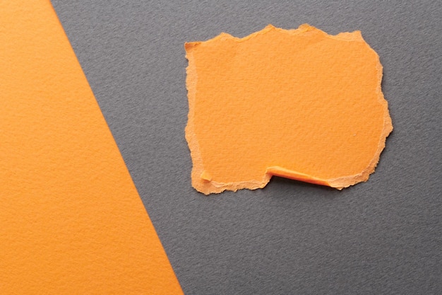 アート・コラージュ - 切り裂かれた紙の切片と切れたの貼り付けメモコレクション - オレンジ色 - 灰色 - ノートブックのページの断片 - 抽象的な背景