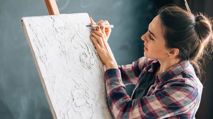 Photo art craft hobby. leisure and lifestyle. woman with modeling tool carving. professional handicraft.