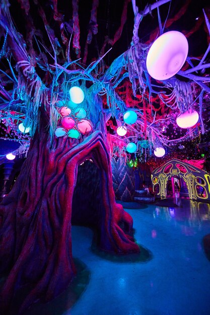 Art display at Otherworld of colorful trees and orbs