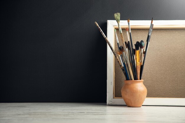 Art equipment paint brushes on table