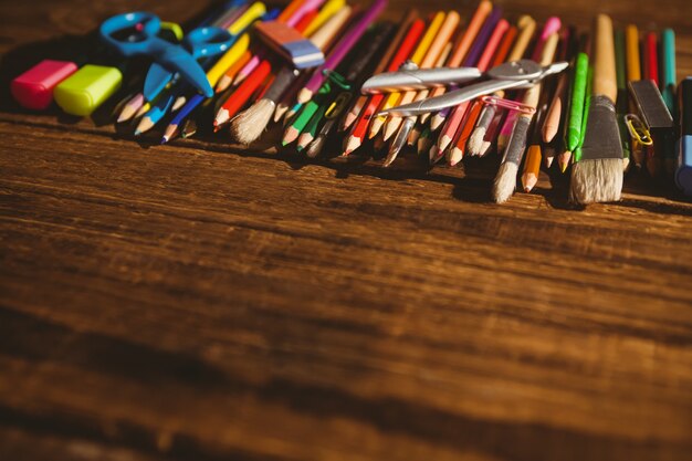 Art supplies on desk with copy space