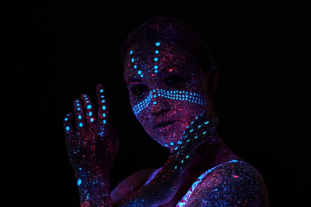 Art woman cosmos in ultraviolet light