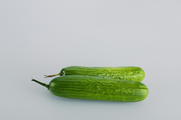 Artful cucumber patterns on natural wood