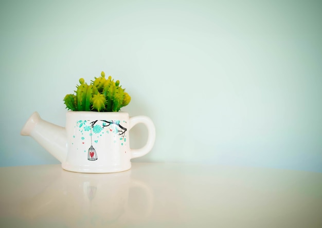 Artificial cactus with blurred background in vintage style 