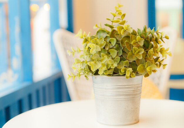 Artificial  flower decorated near window