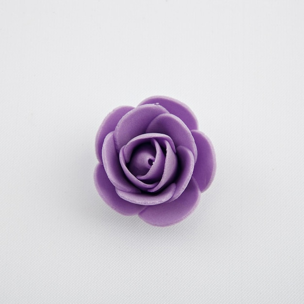 Artificial flowers on white background