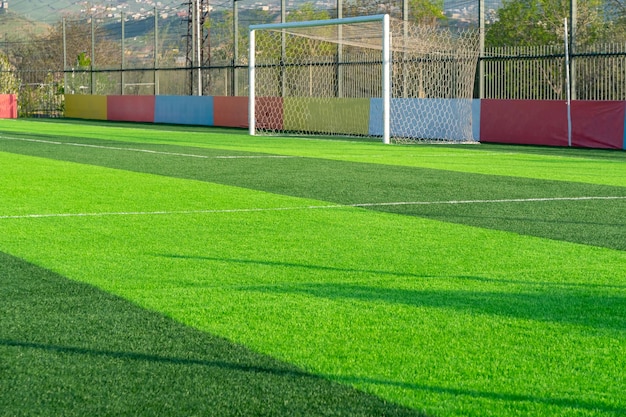 Artificial green grass on a professional soccer field
