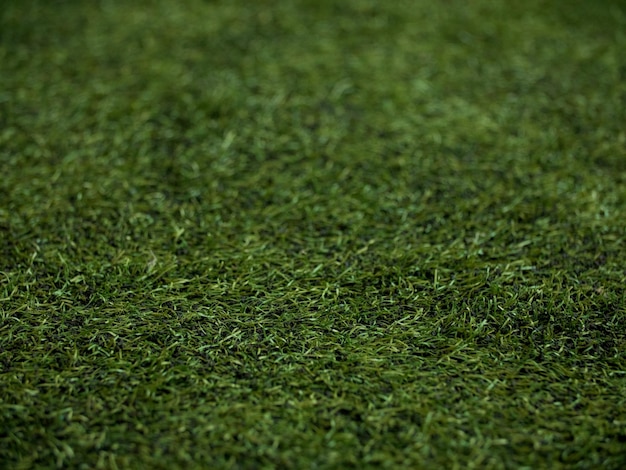 Фото Искусственный зеленый газон с зеленой травой