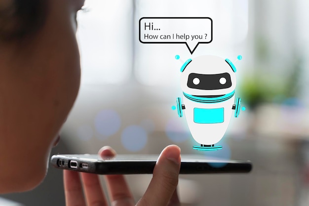 Foto intelligenza artificiale chat bot concept mani che tengono il telefono cellulare su sfondo astratto sfocato chatbot che risponde alle domande online