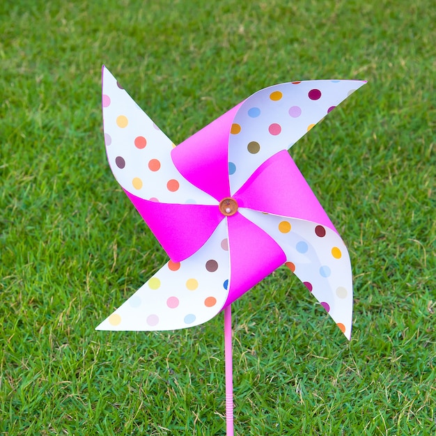 Artificial wind turbine colors embroidered on the lawn