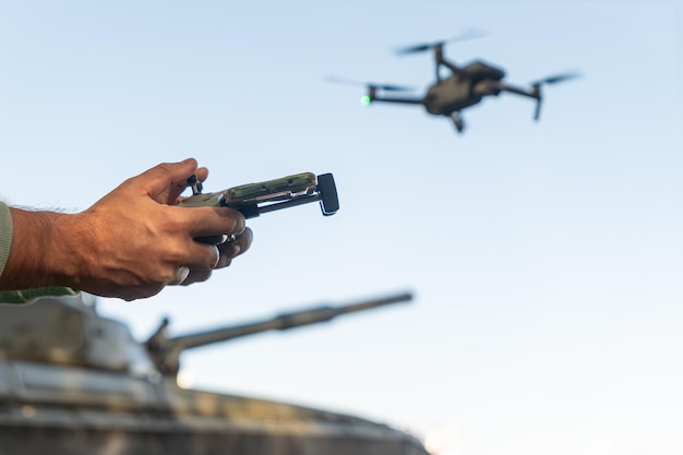 Photo artillery spotter or military observer launches drone into sky force reconnaissance in enemy