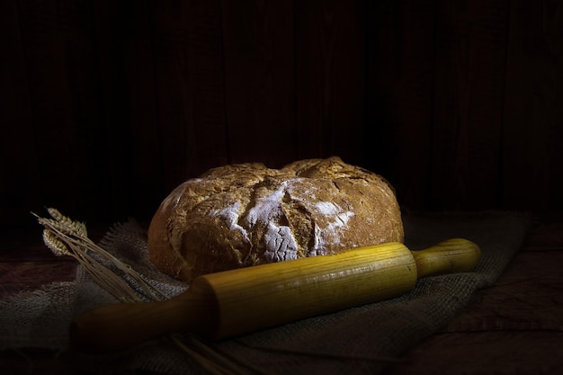 Artisan bread on wooden table.