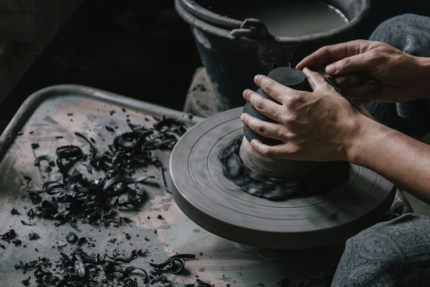 Artisan potter making art pot handicraft