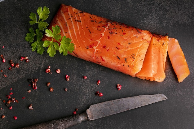 Artisanal smoked salmon on a slate board