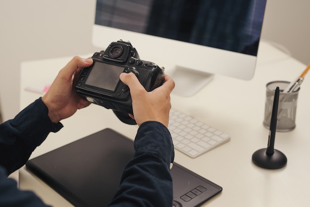 Artist drawing something on graphic tablet