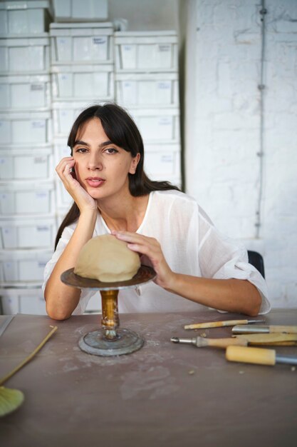 An artist during a pottery class