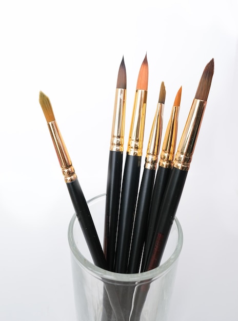 Artist's brushes on white background