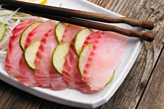 Artistry on a Plate CloseUp of Fresh Tilapia Sashimi in 4K Resolution