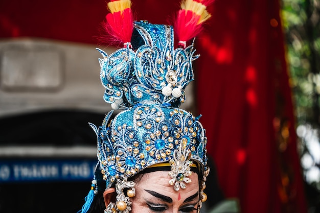 Artists performing Vietnamese classical opera make up for the show in Ho Chi Minh City Vietnam