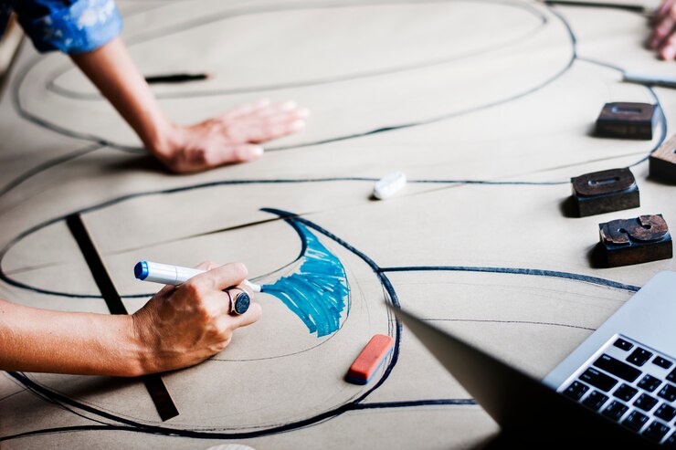 Photo artists working on a new design