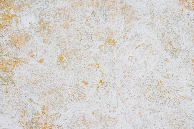 Artwork. Close up of Abstract white watercolor painting art on orange and yellow wall, Brushstrokes of paint in hot toned. Color splashing in paper, Hand drawn, Texture for banner design