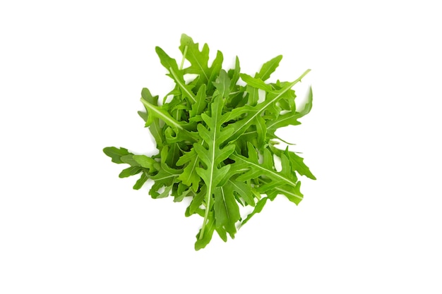 Arugula leaves isolated on white background, top view. Healthy vegan food concept.