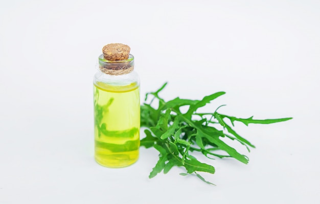 Arugula oil in a small bottle