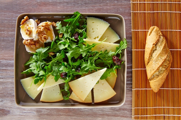 Arugula salad with goat cheese honey and nuts