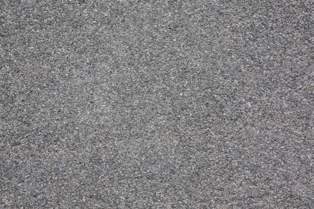 Asfalt achtergrond textuur met een beetje fijnkorrelig wegoppervlak patroon concept bovenkant van het trottoir