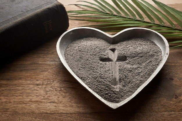 Ash wednesday crucifix made of ash dust as christian religion lent beginning