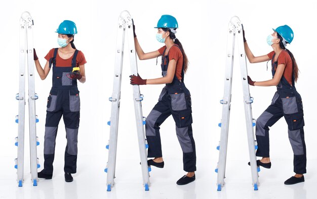 Asian 20s woman wear blue uniform orange shirt hardhat and glove as electric fix repair guy with cable. Full length of tall female climb metal ladder many poses, white background isolated