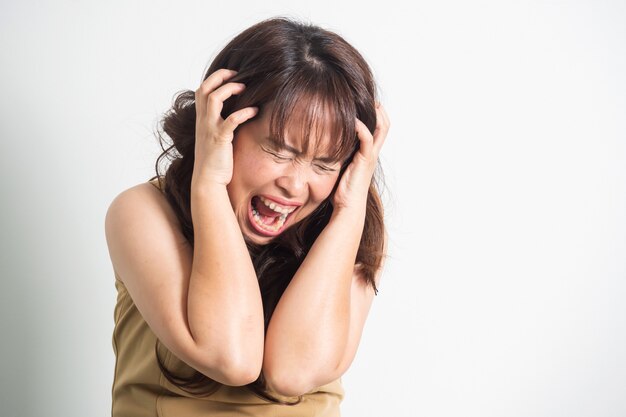 Asian adult woman screaming.