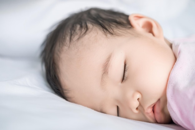 Asian baby sleeping on the bedthailand peoplerelax time