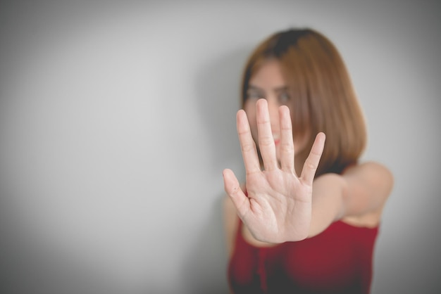 Asian beautiful woman show stop signfive fingers