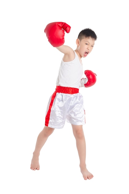 Asian boxer boy punching over white background