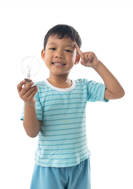 Asian boy holding light bulb isolated , idea and bright concept