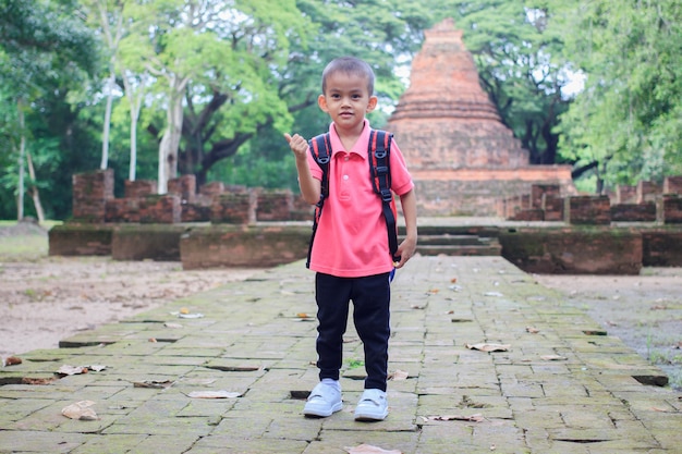 Asian boy smiling walking at Ancient City