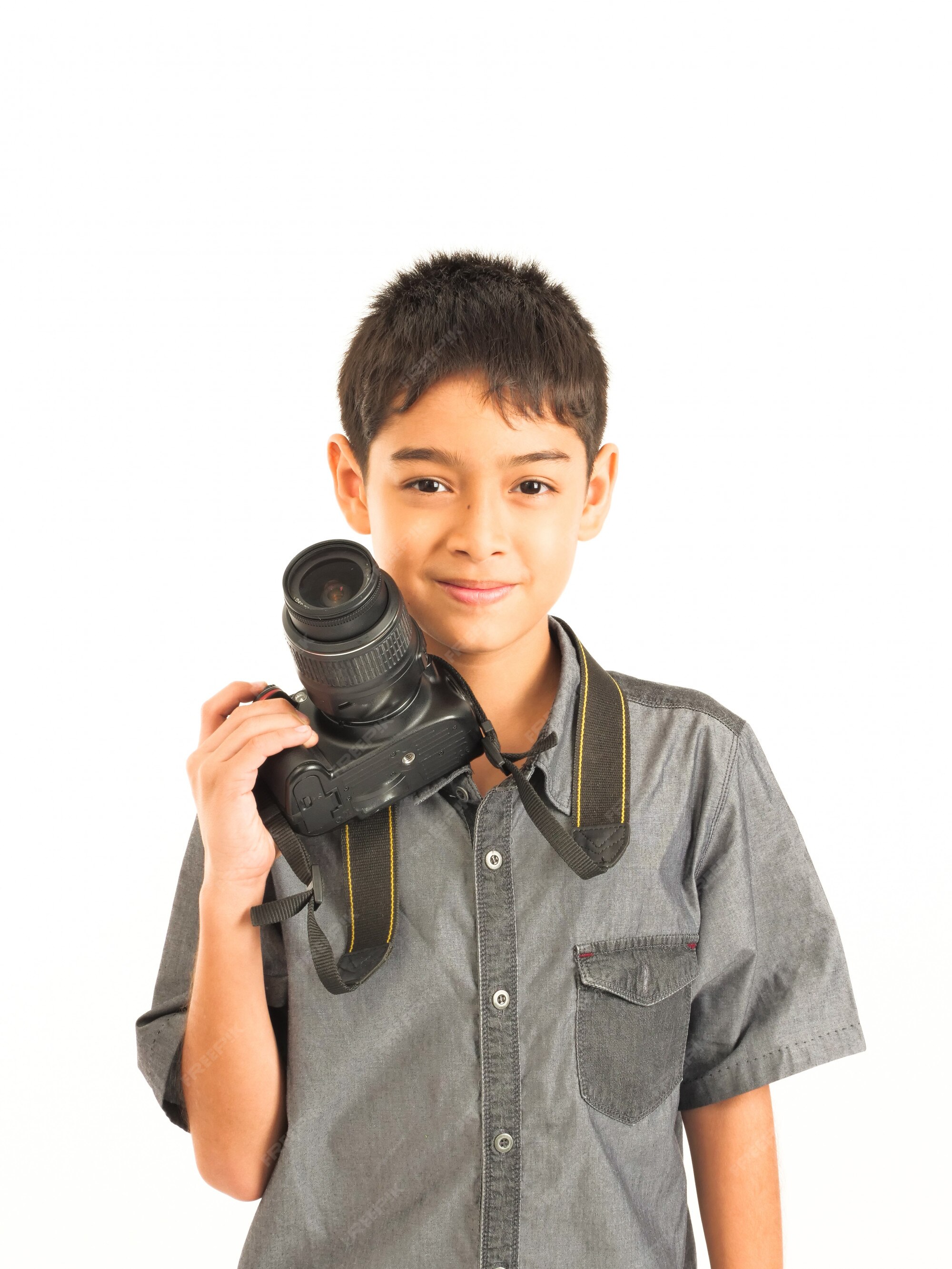 Premium Photo | Asian boy with dslr camera on white background